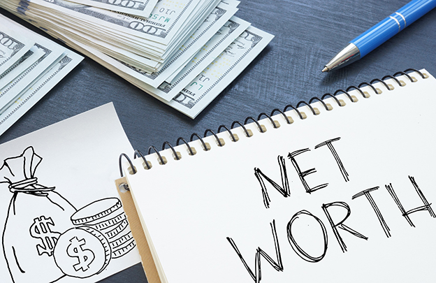 Net Worth written on a notebook next to